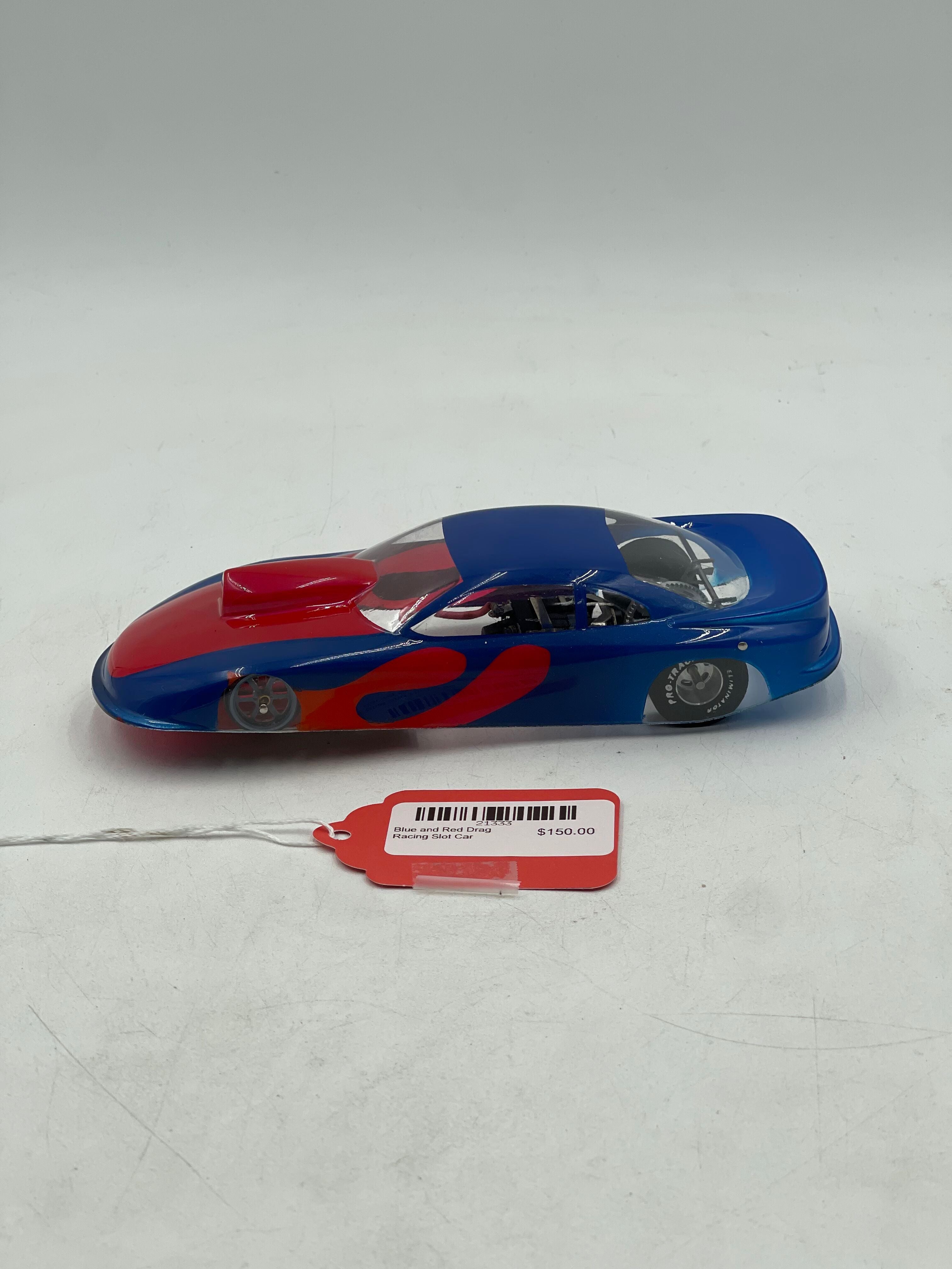 Blue and Red Drag Racing Slot Car