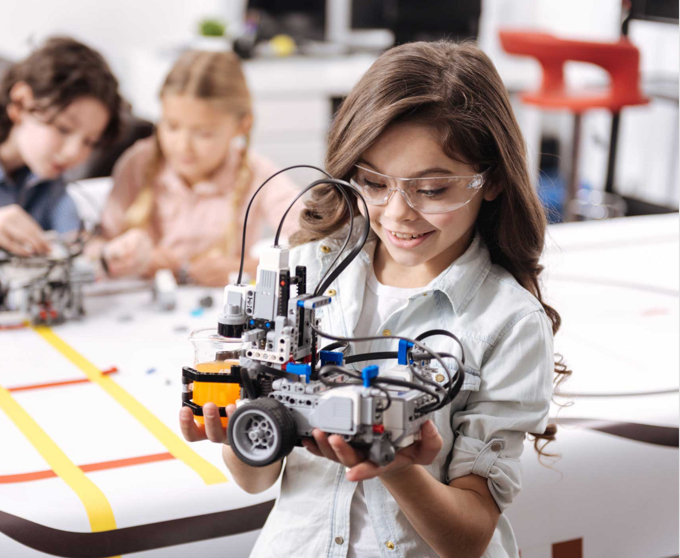 Girl building scientific invention