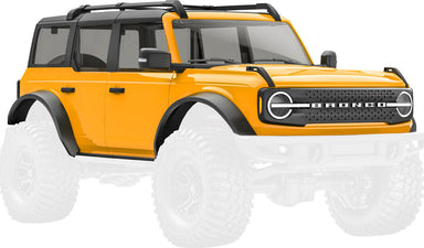 Body, Ford Bronco, complete, Cyber Orange (includes grille, side mirrors, door handles, fender flares, windshield wipers, spare tire mount, & clipless mounting) (requires #9735 front & rear bumpers)